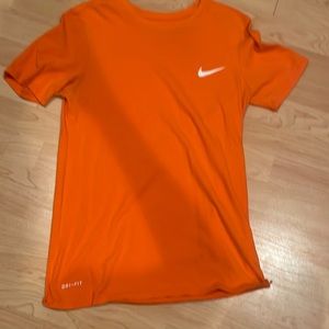 Orange Nike shirt